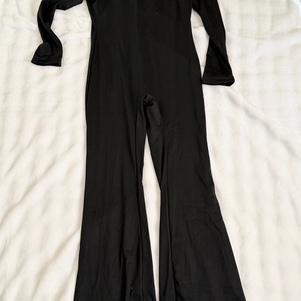 Black Women's Jumpsuit - Sleek Long Sleeve Flared Leg